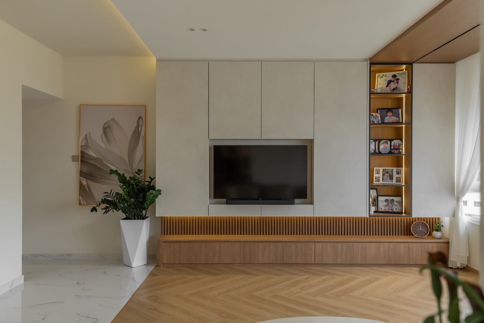 Scandinavian living room with built-in storage in a new Singapore BTO unit